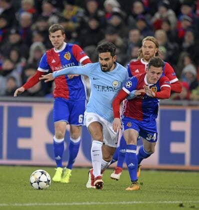 13 02 2018 football UEFA Champions League 2017 2018 knockout FC Basel Manchester City at St James Park Stadium in Basel Switzerland v li Ilkay Gündogan Manchester City against Taulant Xhaka FC Basel
