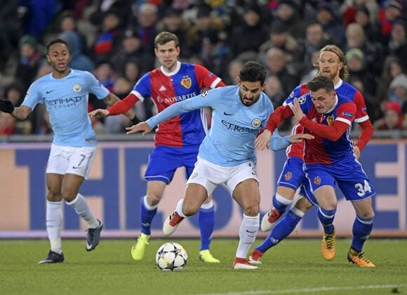 13 02 2018 football UEFA Champions League 2017 2018 knockout FC Basel Manchester City at St James Park Stadium in Basel Switzerland v li Ilkay Gündogan Manchester City against Taulant Xhaka FC Basel