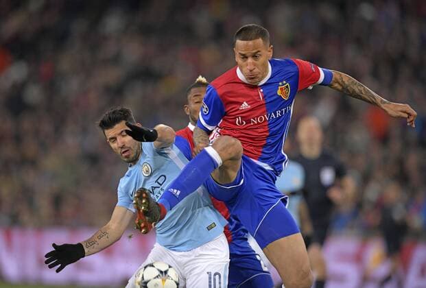 13 02 2018 football UEFA Champions League 2017 2018 knockout FC Basel Manchester City at St James Park Stadium in Basel Switzerland v li Sergio Agüero Manchester City Leo Lacroix FC Baswel
