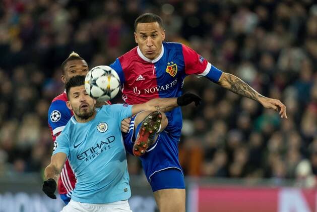 Basel Switzerland 13 02 2018 UEFA Champions League 2017 18 season last finals FC Basel Manchester City Sergio Agüero MNC and Leo Lacroix FCB in a duel of DeFodi507