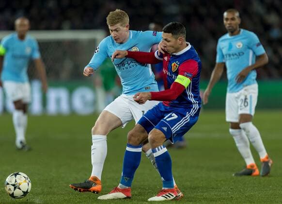 Basel Switzerland 13 02 2018 UEFA Champions League 2017 18 season last finals FC Basel Manchester City Kevin De Bruyne MNC and Marek Suchy FCB in a duel of DeFodi507