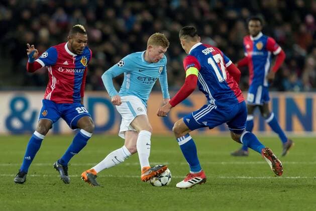 Basel Switzerland 13 02 2018 UEFA Champions League 2017 18 season last finals FC Basel Manchester City Geoffroy Serey the FCB Marek Suchy FCB and Kevin De Bruyne MNC in the duel of DeFodi507
