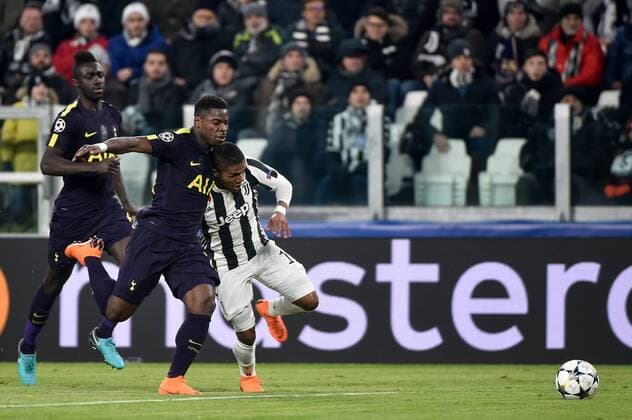February 13, 2018 - Turin, Italy - Douglas Costa of Juventus is fauled by Serge Aurier of Tottenham and wins a penalty kick during the UEFA Champions League Round of 16 match between Juventus and Tottenham Hotspur at the Juventus Stadium, Turin, Italy on 13 February 2018. Juventus v Tottenham - UEFA Champions League  - ZUMAn230 20180213_zaa_n230_578 Copyright: xGiuseppexMaffiax