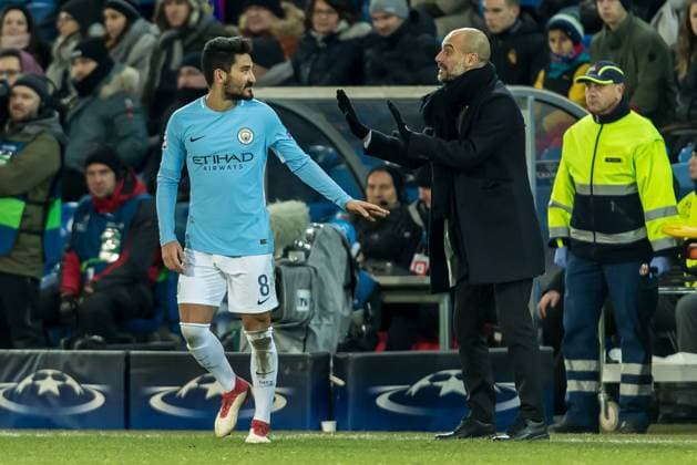 Basel Switzerland 13 02 2018 UEFA Champions League 2017 18 season last finals FC Basel Manchester City coach Josep Guardiola MNC speaks with Ilkay Gündogan MNC DeFodi507
