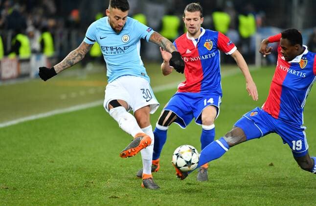 13 02 2018 Basel St James Park football men s season 2017 2018 Champions League FC Basel Manchester City picture shows Nicolas Otamendi Manchester against Valentin Stocker and Dimitri Oberlin both FC Basel Action