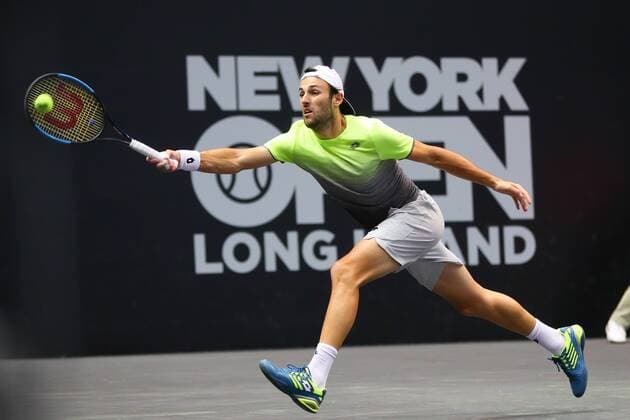 UNIONDALE, NY - FEBRUARY 13: Stefano Travaglia of Italy returns during the New York Open Tennis on February 13, 2018, at NYCB Live in Uniondale, NY. (Photo by Rich Graessle Icon Sportswire) TENNIS: FEB 13 New York Open Icon0213181535 EDITORIAL USE ONLY