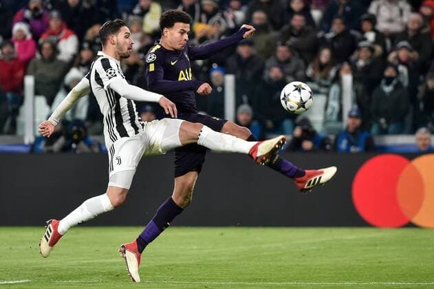 February 13, 2018 - Turin, Italy - Mattia De Sciglio of Juventus challenges Dele Alli of Tottenham during the UEFA Champions League Round of 16 match between Juventus and Tottenham Hotspur at the Juventus Stadium, Turin, Italy on 13 February 2018. Juventus v Tottenham - UEFA Champions League  - ZUMAn230 20180213_zaa_n230_588 Copyright: xGiuseppexMaffiax