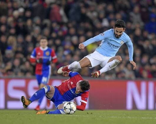 13 02 2018 football UEFA Champions League 2017 2018 knockout FC Basel Manchester City at St James Park Stadium in Basel Switzerland v li Taulant Xhaka FC Basel against Ilkay Gündogan Manchester City