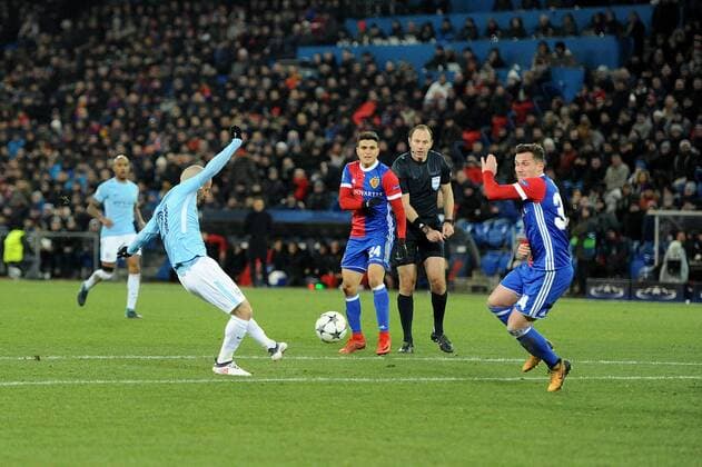 13th February 2018, St Jakob Park, Basel, Switzerland; UEFA Champions League football, round of 16, first leg, FC Basel versus Manchester City; David Silva of Manchester City takes a shot during the match from the top of the box  ActionPlus11986706