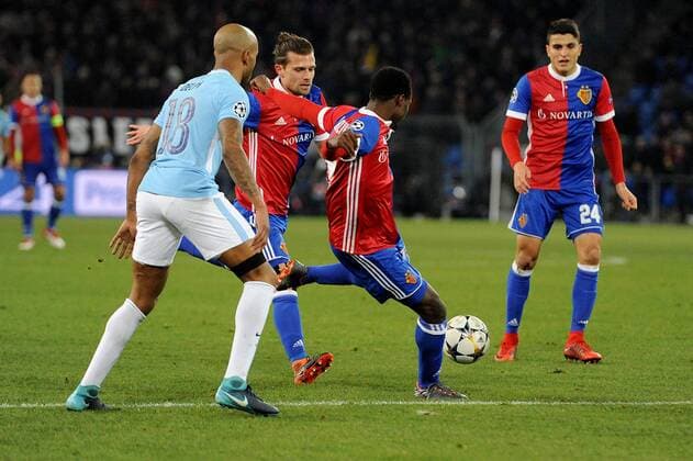13th February 2018, St Jakob Park, Basel, Switzerland; UEFA Champions League football, round of 16, first leg, FC Basel versus Manchester City; Dimitri Oberlin of FC Basel shoots past defender Fabian Delph of Manchester City  ActionPlus11986752
