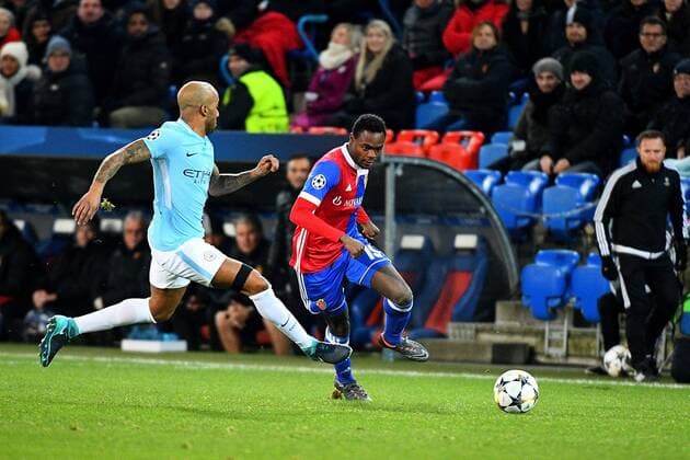 13th February 2018, St Jakob Park, Basel, Switzerland; UEFA Champions League football, round of 16, first leg, FC Basel versus Manchester City; Fabian Delph of Manchester City challenges Dimitri Oberlin of FC Basel for the ball  ActionPlus11986780