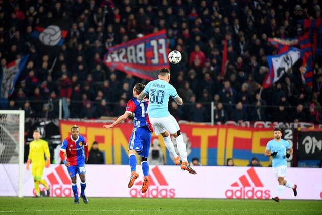 13th February 2018, St Jakob Park, Basel, Switzerland; UEFA Champions League football, round of 16, first leg, FC Basel versus Manchester City; Nicolas Otamendi of Manchester City challenges Valentin Stocker of FC Basel for the ball  ActionPlus11986785