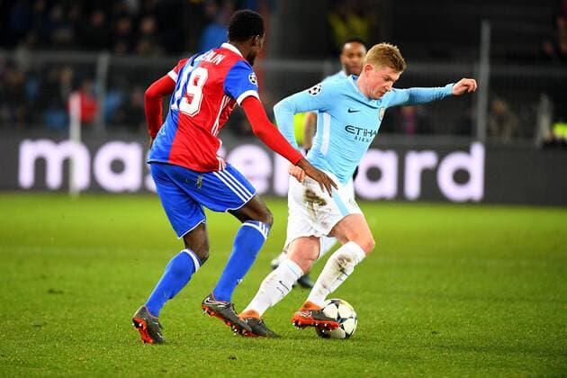 13th February 2018, St Jakob Park, Basel, Switzerland; UEFA Champions League football, round of 16, first leg, FC Basel versus Manchester City; Kevin de Bruyne of Manchester City is challenged for the ball by Dimitri Oberlin of FC Basel  ActionPlus11986786