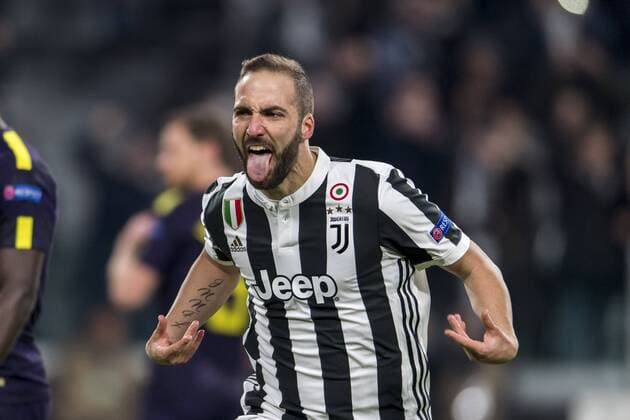 Gonzalo Gerardo Higuain of Juventus celebrates after scoring his team s second goal during the Italian Uefa Champions League Round of 16 First leg match between Juventus 2-2 Tottenham Hotspur at Allianz Stadium on February 13, 2018 in Torino, Germany. Noxthirdxpartyxsales  (72086780)