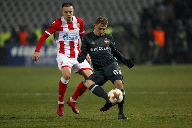 (180214) -- BELGRADE, Feb. 14, 2018 -- Crvena Zvezda s Milan Rodic(L) vies with CSKA Moscow s Fedor Chalov during the UEFA Europa League round of 32 first leg football match between Crvena Zvezda and CSKA Moscow in Belgrade, Serbia on Feb. 13, 2018. The match ended with 0-0.) (SP)SERBIA-BELGRADE- EUROPA-FOOTBALL-CRVENA ZVEZDA VS CSKA PredragxMilosavljevic 