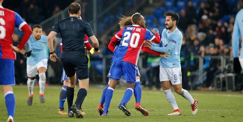 13 02 2018 St Jakob Park Basel Switzerland season 2017 2018 men s football UEFA Champions League 1 8 final first leg FC Basel Manchester City FC Geoffroy Serey the li FC Basel against Ilkay Gündogan Manchester City