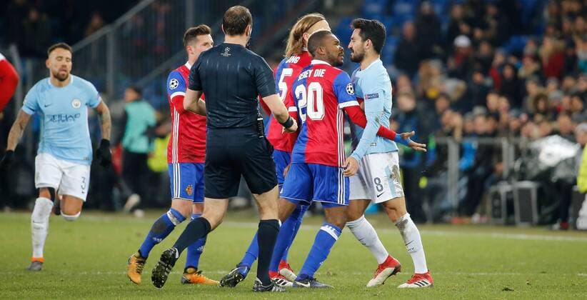 13 02 2018 St Jakob Park Basel Switzerland season 2017 2018 men s football UEFA Champions League 1 8 final first leg FC Basel Manchester City FC Geoffroy Serey the li FC Basel against Ilkay Gündogan Manchester City
