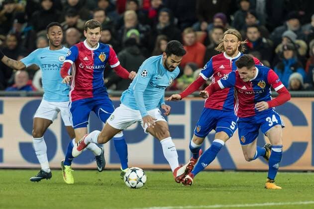Basel Switzerland 13 02 2018 UEFA Champions League 2017 18 season last finals FC Basel Manchester City Ilkay Gündogan MNC and Taulant Xhaka FCB in a duel of DeFodi507