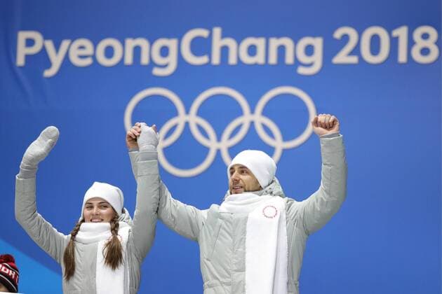 PYEONGCHANG, SOUTH KOREA - FEBRUARY 14, 2018: Bronze medalists, Olympic Athletes from Russia Anastasia Bryzgalova (L) and Aleksandr Krushelnitckii during a medal ceremony for the curling mixed doubles competition at the 2018 Winter Olympic Games Olympische Spiele Olympia OS at Medals Plaza. Sergei Bobylev TASS  TS073BF3