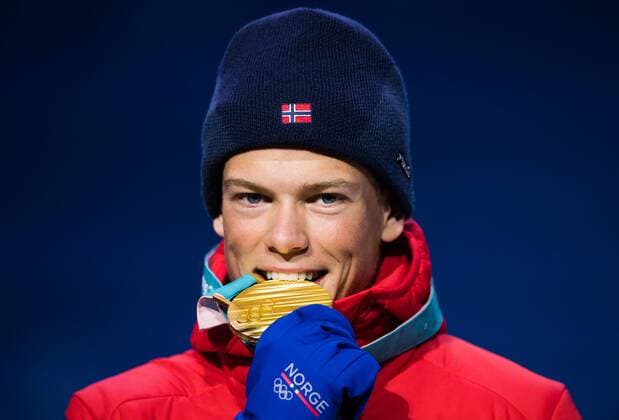 180214 Johannes Hosflot Klaebo of Norway Gold celebrates at the medal ceremony for the Men s Cross Country Sprint during day five of the 2018 Winter Olympics on February 14 2018 in Pyeongchang Photo Carl Sandin BILDBYRAN code CS 57999 292  Copyright: CARLxSANDIN BB180214CS095