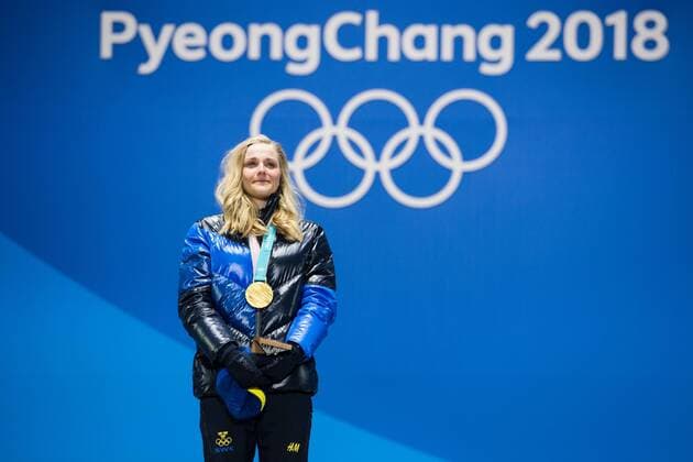 180214 Stina Nilsson of Sweden Gold celebrates at the medal ceremony for the Men s Cross Country Sprint during day five of the 2018 Winter Olympics on February 14 2018 in Pyeongchang Photo Carl Sandin BILDBYRAN code CS 57999 292  Copyright: CARLxSANDIN BB180214CS104