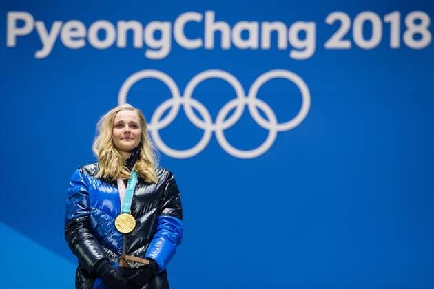 180214 Stina Nilsson of Sweden Gold celebrates at the medal ceremony for the Men s Cross Country Sprint during day five of the 2018 Winter Olympics on February 14 2018 in Pyeongchang Photo Carl Sandin BILDBYRAN code CS 57999 292  Copyright: CARLxSANDIN BB180214CS105