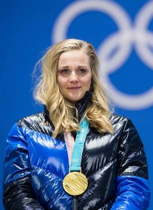 180214 Stina Nilsson of Sweden Gold into tears while celebrating at the medal ceremony for the Men s Cross Country Sprint during day five of the 2018 Winter Olympics on February 14 2018 in Pyeongchang Photo Carl S BILDBYR N code CS 57999 292  Copyright: CARLxSANDIN BB180214CS107