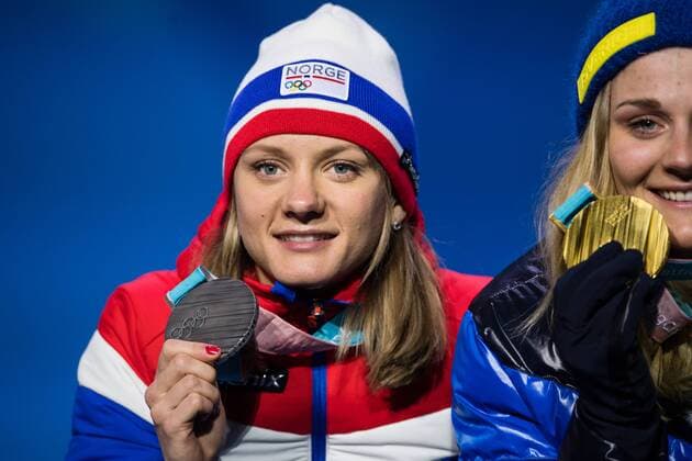 180214 Maiken Caspersen Falla of Norway Silver and Stina Nilsson of Sweden Gold celebrating at the medal ceremony for the Women s Cross Country Sprint during day five of the 2018 Winter Olympics on February 14 2018 in Pyeongchang Photo Carl S BILDBYR N code CS 57999 292  Copyright: CARLxSANDIN BB180214CS112