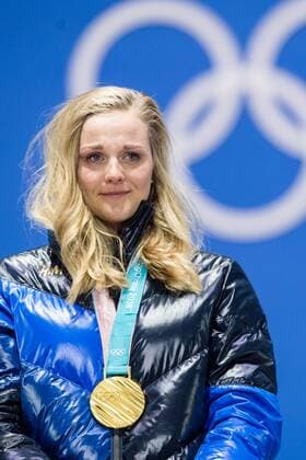 180214 Stina Nilsson of Sweden Gold celebrating at the medal ceremony for the Women s Cross Country Sprint during day five of the 2018 Winter Olympics on February 14 2018 in Pyeongchang Photo Carl S BILDBYR N code CS 57999 292  Copyright: CARLxSANDIN BB180214CS113