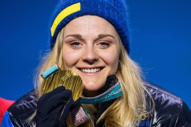 180214 Stina Nilsson of Sweden Gold celebrating at the medal ceremony for the Women s Cross Country Sprint during day five of the 2018 Winter Olympics on February 14 2018 in Pyeongchang Photo Carl S BILDBYR N code CS 57999 292  Copyright: CARLxSANDIN BB180214CS115
