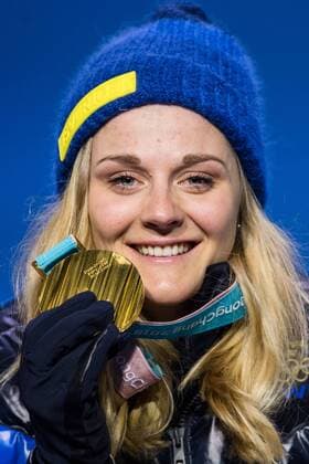 180214 Stina Nilsson of Sweden Gold celebrating at the medal ceremony for the Women s Cross Country Sprint during day five of the 2018 Winter Olympics on February 14 2018 in Pyeongchang Photo Carl S BILDBYR N code CS 57999 292  Copyright: CARLxSANDIN BB180214CS116