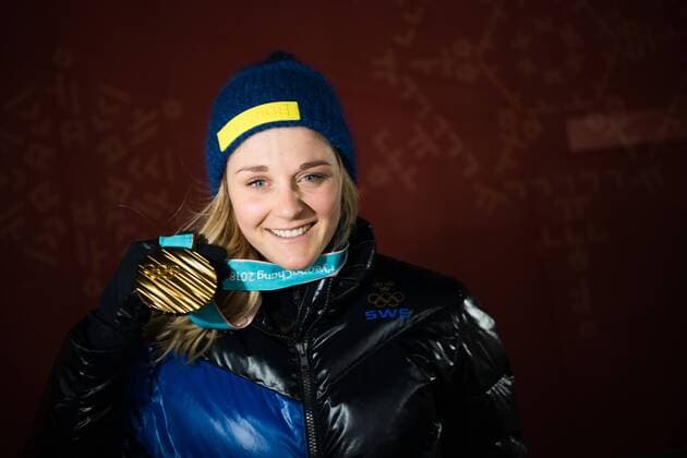 180214 Stina Nilsson of Sweden Gold celebrating at the medal ceremony for the Women s Cross Country Sprint during day five of the 2018 Winter Olympics on February 14 2018 in Pyeongchang Photo Carl Sandin BILDBYRAN code CS 57999 292  Copyright: CARLxSANDIN BB180214CS119