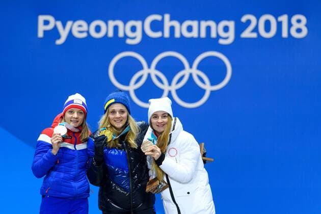 180214 Maiken Caspersen Falla of Norway Silver Stina Nilsson of Sweden Gold and Yulia Belorukova of Russia OAR bronze at the medal ceremony for the Women s Cross Country Sprint during day five of the 2018 Winter Olympics on February 14 2018 in Pyeongchang Photo Carl S BILDBYR N code CS 57999 292  Copyright: CARLxSANDIN BB180214CS136