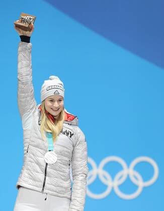 (180214) -- PYEONGCHANG, Feb. 14, 2018 -- Second-placed Dajana Eitberger from Germany poses for photos during medal ceremony of women s singles event of luge at 2018 PyeongChang Winter Olympic Games Olympische Spiele Olympia OS at the Medal Plaza in PyeongChang, South Korea, Feb. 14, 2018. ) (SP)OLY-SOUTH KOREA-PYEONGCHANG-LUGE-WOMEN S SINGLES-MEDAL CEREMONY WuxZhuang 
