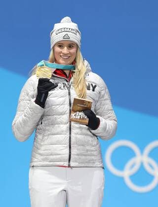 (180214) -- PYEONGCHANG, Feb. 14, 2018 -- Champion Natalie Geisenberger from Germany poses for photos during medal ceremony of women s singles event of luge at 2018 PyeongChang Winter Olympic Games Olympische Spiele Olympia OS at the Medal Plaza in PyeongChang, South Korea, Feb. 14, 2018. ) (SP)OLY-SOUTH KOREA-PYEONGCHANG-LUGE-WOMEN S SINGLES-MEDAL CEREMONY WuxZhuang 