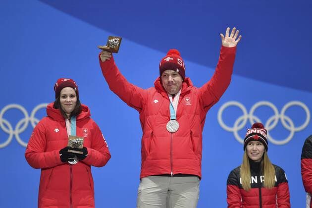 Team Switzerland SUI with Jenny PERRET and Martin RIOS 2 square silver silver silver medalist curling mixed doubles Xurling mixed double cheers cheers joy enthusiasm emotion cheer cheers victory ceremony PyeongChang Olympic medals Plaza ceremony on 14 02 2018 Winter Olympics 2018 from 09 02 25 02 2018 in PyeongChang Korea Â