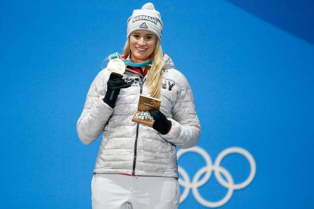 Women s Singles Luge gold medalist Natalie Geisenberger of Germany celebrates on the podium at the medals ceremony for the 2018 Pyeongchang Winter Olympics at the Pyeongchang Medals Plaza in Pyeongchang, South Korea, on February 14, 2018.  OLY20180214132 MATTHEWxHEALEY
