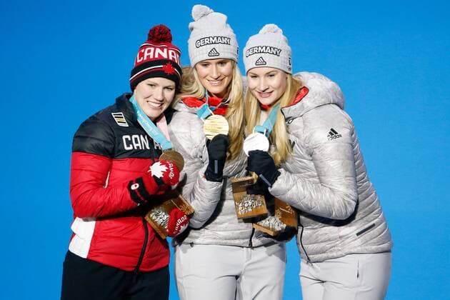 From left Women s Singles Luge bronze medalist Alex Gough of Canada, gold medalist Natalie Geisenberger of Germany and silver medalist Dajana Eitberger of Germany pose for a photo on the podium at the medals ceremony for the 2018 Pyeongchang Winter Olympics at the Pyeongchang Medals Plaza in Pyeongchang, South Korea, on February 14, 2018.  OLY20180214133 MATTHEWxHEALEY