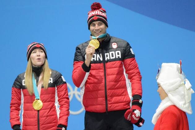 February 14, 2018 - Pyeongchang, South Korea - KAITLYN LAWES and JOHN MORRIS of Canada celebrate getting the gold medal in the Mixed Doubles curling event in the PyeongChang Olympic Games Olympische Spiele Olympia OS PyeongChang 18: Curling Mixed Doubles - ZUMAl132 20180214_zap_l132_105 Copyright: xChristopherxLevyx