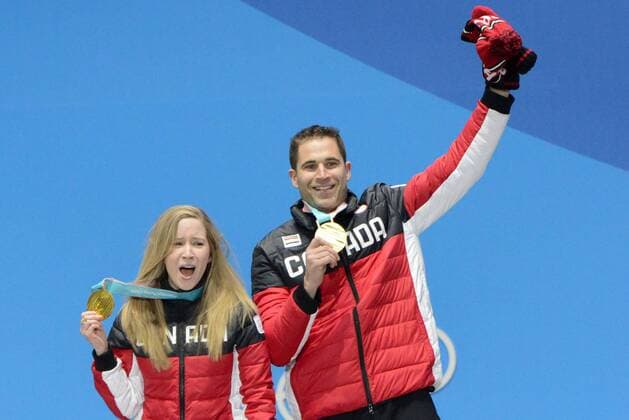 February 14, 2018 - Pyeongchang, South Korea - KAITLYN LAWES and JOHN MORRIS of Canada celebrate getting the gold medal in the Mixed Doubles curling event in the PyeongChang Olympic Games Olympische Spiele Olympia OS PyeongChang 18: Curling Mixed Doubles - ZUMAl132 20180214_zap_l132_106 Copyright: xChristopherxLevyx