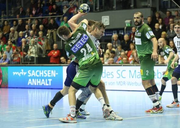 14 02 xcsx 2018 handball EHF Cup SC Magdeburg Bjerringbro Silkeborg of emspor v l Christian O Sullivan SC Magdeburg against Michael V Knudsen Bjerringbro Silkeborg duel battle for the ball Magdeburg