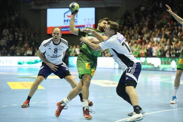 14 02 xcsx 2018 handball EHF Cup SC Magdeburg Bjerringbro Silkeborg of emspor v l Marko Bezjak SC Magdeburg Lars Christian Gade Skaarup Bjerringbro Silkeborg duel battle for the ball Magdeburg