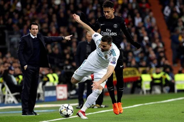 Real Madrid s Nacho Fernandez vies for the ball with Paris Saint Germain s Neymar da Silva during the UEFA Champions League round of 16 first leg match between Real Madrid and Paris Saint Germain at the Santiago Bernabeu stadium in Madrid, Spain, 14 February 2018. Real Madrid vs. Paris Saint Germain !ACHTUNG: NUR REDAKTIONELLE NUTZUNG!  Copyright: xKikoxHuescax MAD006 20180214-636542400912858353