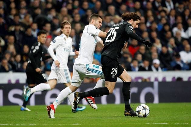 Real Madrid s Nacho Fernandez (L) vies for the ball with Paris Saint Germain s Adrien Rabiot during the UEFA Champions League round of 16 first leg match between Real Madrid and Paris Saint Germain at the Santiago Bernabeu stadium in Madrid, Spain, 14 February 2018. Real Madrid vs. Paris Saint Germain !ACHTUNG: NUR REDAKTIONELLE NUTZUNG!  Copyright: xJuanjoxMartinx MAD022 20180214-636542433435122500