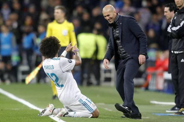 Real Madrid s Marcelo Vieira celebrates goal with the coach Zinedine Zidane during Champions League Round of 16 1st leg match. February 14,2018.  (2018021452)