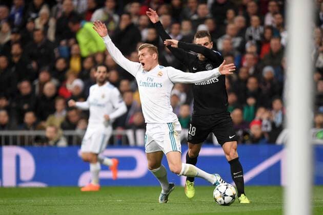 18 Giovanni Lo Celso (psg) - 08 Toni Kroos (real) - FAUTE FOOTBALL : Real Madrid vs Paris SG - Ligue des Champions - 14 02 2018 AnthonyBIBARD FEP Panoramic 