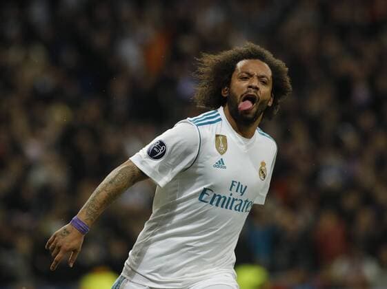 Partido de ida de octavos de la Liga de Campeones entre el Real Madrid y el PSG en el Bernabeu. En la imagen, Marcelo celebra su gol. First leg of 1 8 Champions League match between Real Madrid and PSG. In this picture, Marcelo celebrates his goal. 