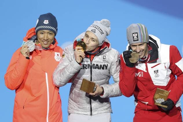 (180215) -- PYEONGCHANG, Feb. 15, 2018 -- Gold medalist Eric Frenzel (C) from Germany, silver medalist Akito Watabe (L) from Japan and Lukas Klapfer from Austria pose for photos during the medal ceremony of individual gundersen NH 10KM event of nordic combined at Pyeongchang 2018 Winter Olympic Games Olympische Spiele Olympia OS at Medal Plaza, PyeongChang, South Korea, Feb. 15, 2018. ) (SP)OLY-SOUTH KOREA-PYEONGCHANG-NORDIC COMBINED-INDIVIDUAL GUNDERSEN NH 10KM-MEDAL CEREMONY WuxZhuang 