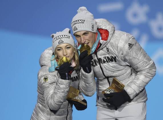(180215) -- PYEONGCHANG, Feb. 15, 2018 -- Gold medalists Aljona Savchenko (L) and Bruno Massot of Germany pose for photos during medal ceremony of pair skating of Figure skating Eiskunstlauf at PyeongChang 2018 Winter Olympic Games Olympische Spiele Olympia OS at Medal Plaza, PyeongChang, South Korea, Feb. 15, 2018. ) (SP)OLY-SOUTH KOREA-PYEONGCHANG-FIGURE SKATING-PAIR SKATING-MEDAL CEREMONY WuxZhuang 