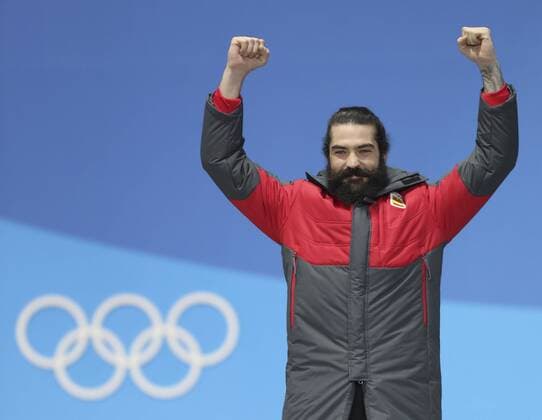 (180215) -- PYEONGCHANG, Feb. 15, 2018 -- Bronze medalist Spain s Regino Hernandez poses for photos during the medal ceremony of men s snowboard cross at the 2018 PyeongChang Winter Olympic Games Olympische Spiele Olympia OS at Medal Plaza, PyeongChang, South Korea, on Feb. 15, 2018. ) (SP)OLY-SOUTH KOREA-PYEONGCHANG-SNOWBOARD-MEN S CROSS FINAL-MEDAL CEREMONY WuxZhuang 